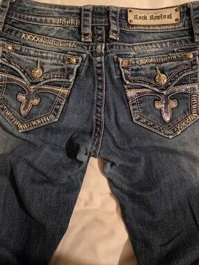 Rock Revival Woman's Dark Blue Relaxed Fit Jeans with Orange Logo Trim. 27